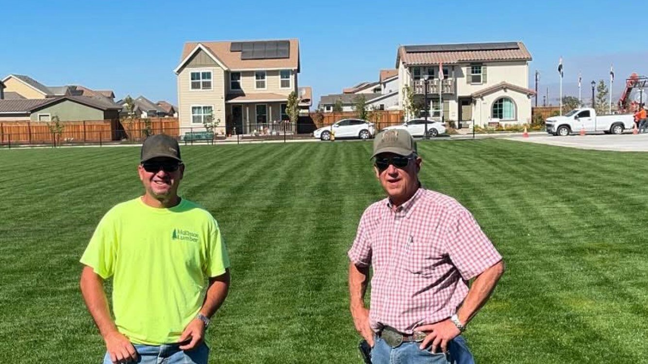 Mike Pivetti and his father standing together outdoors
